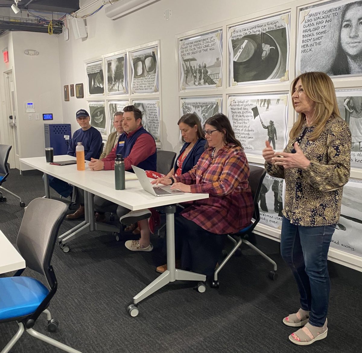 A panel, moderated by faculty such as Roseann "Chic" Canfora (far right), discusses free speech and protest at the university level on April 15, 2024.