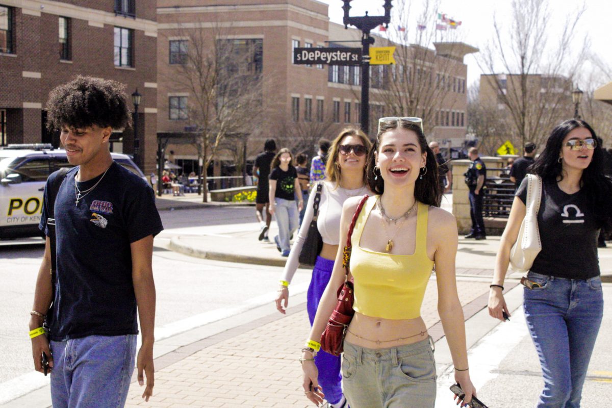 Junior fashion design student Catherine MacGregor and friends head Downtown to watch the 2024 solar eclipse April 8, 2024.