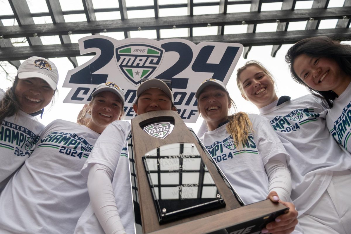 The team poses with the trophy following the final round of the Mid-American Conference Championships in Grove City, OH, on April 24, 2024.