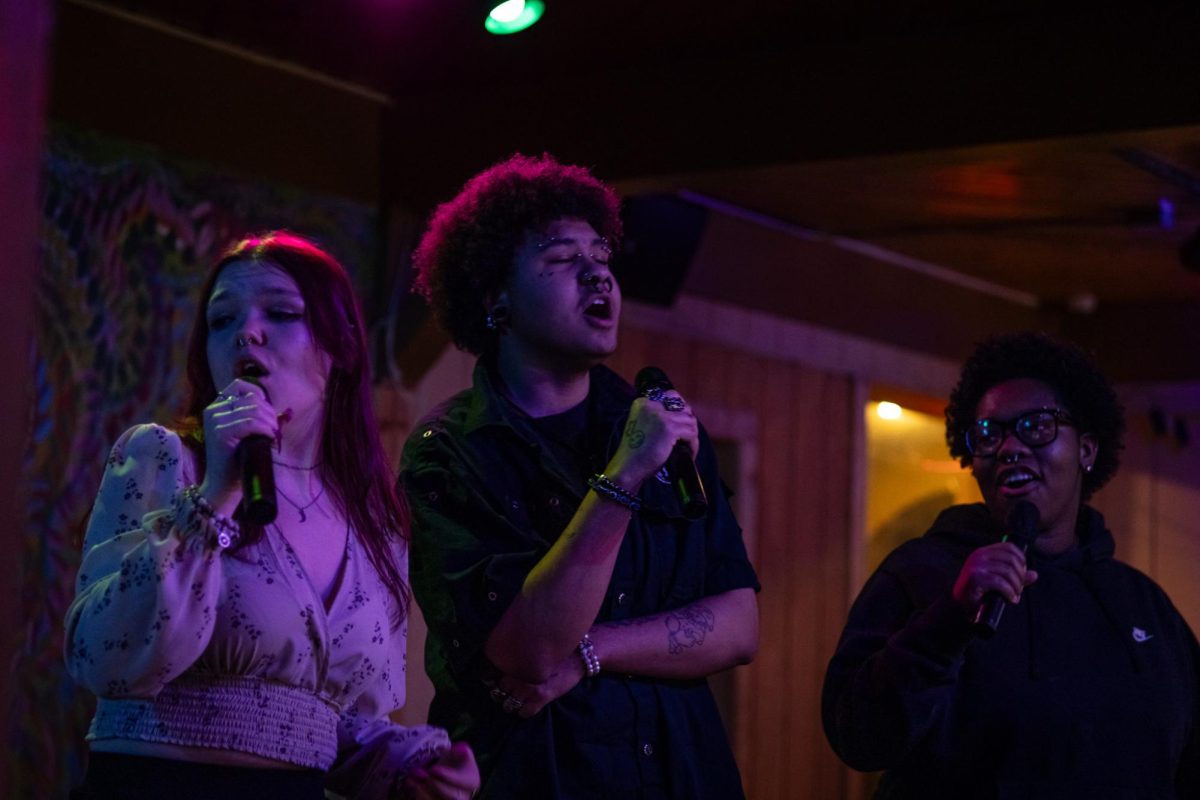 Karaoke night regulars Audreaina Robinson, Marysa Clark and L Schmidt sing Teenage Dirtbag by Wheatus at The Burnt Pickle on March 20, 2024.