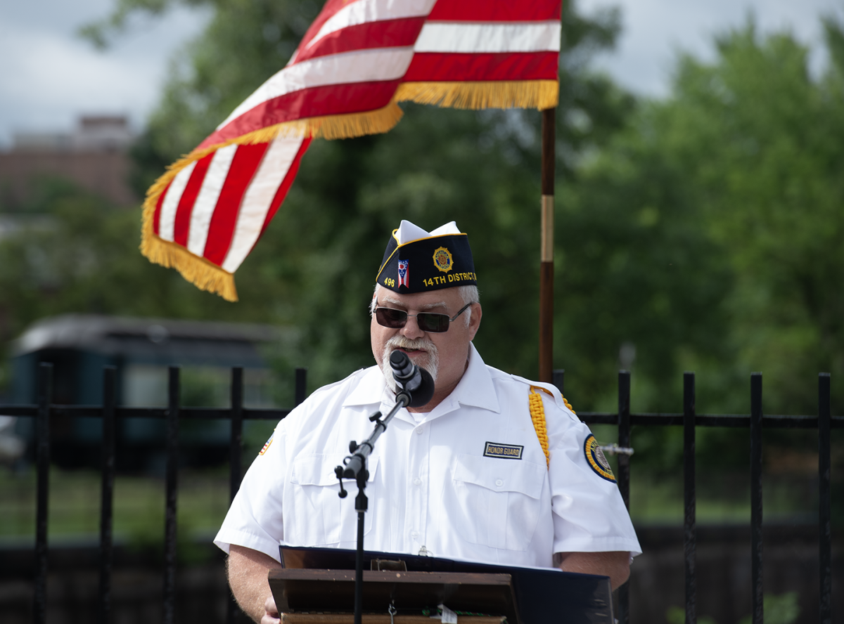 Rodger Wiant, honor guard 1st vice commander, speaks before the Kent Memorial Day parade on Monday, May 27.