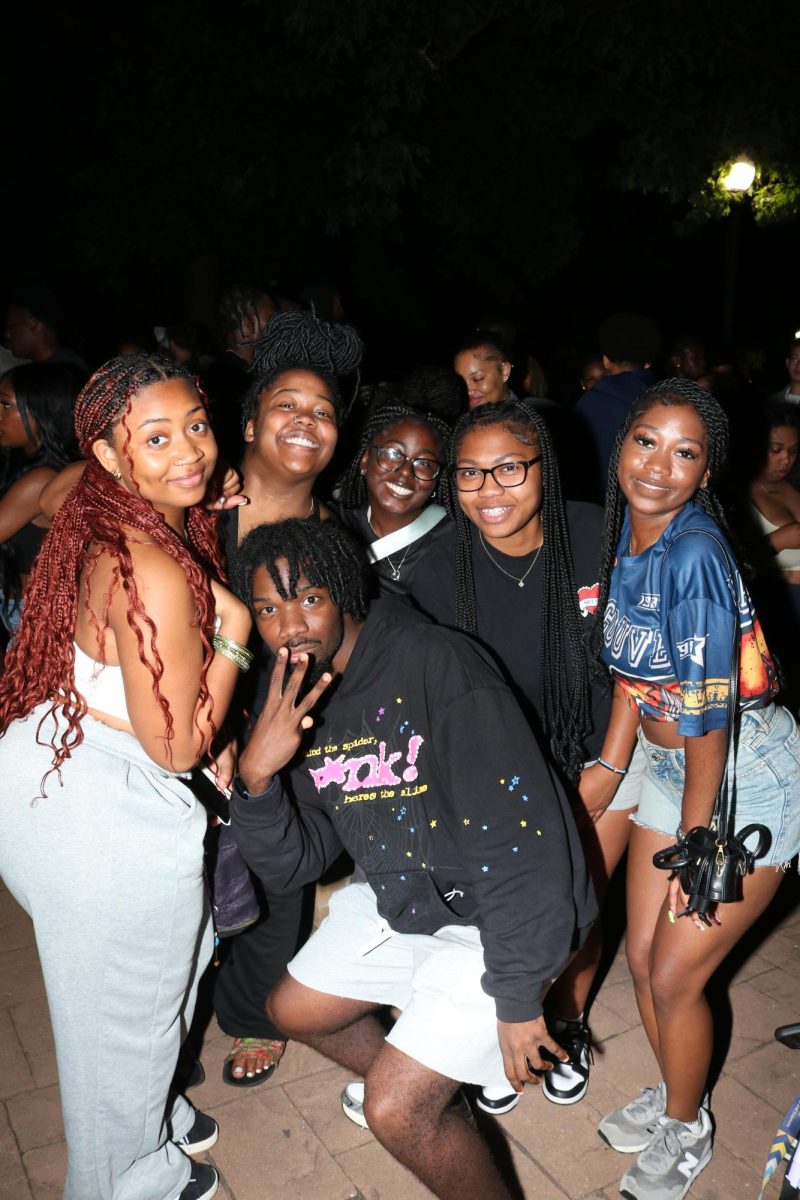 Kent State freshmen pose for a photo at BUS's block party outside of Oscar Ritchie Hall in celebration of the start of the new fall semester on August 29, 2024.