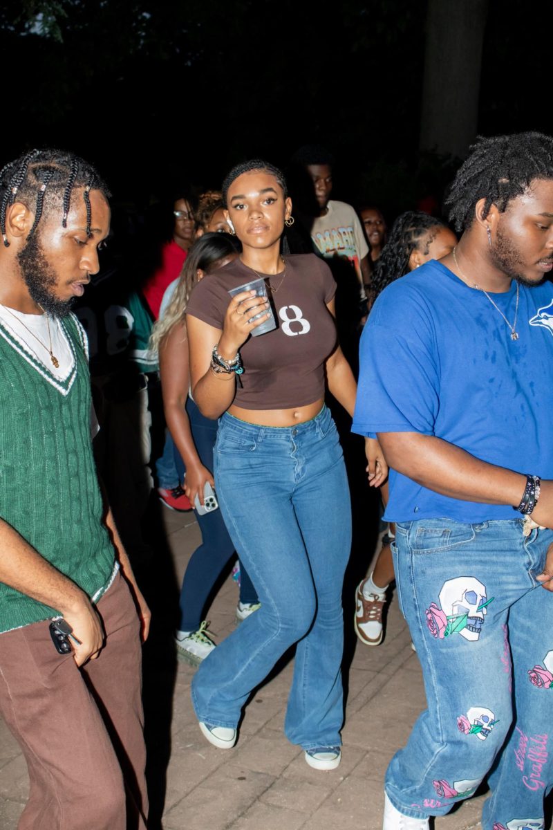 Students line dance together at BUS's Block Party outside of Oscar Ritchie Hall in celebration of the new fall semester at Kent State University on August 29th, 2024. 