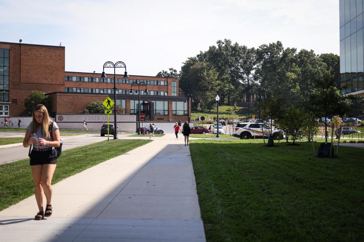 Students walk along the front end of Kent State's campus Aug. 27, 2024.