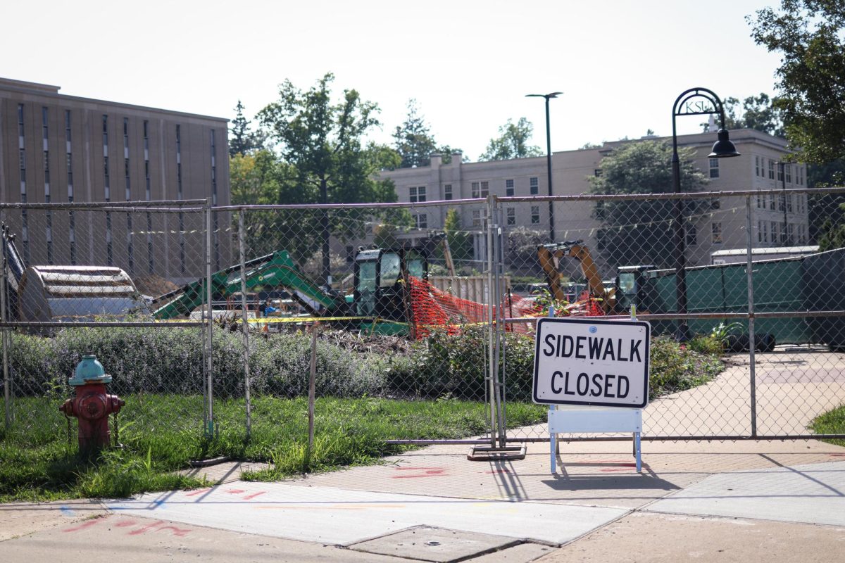 The parking lot and sidewalk by White Hall are gated off on August 27, 2024.