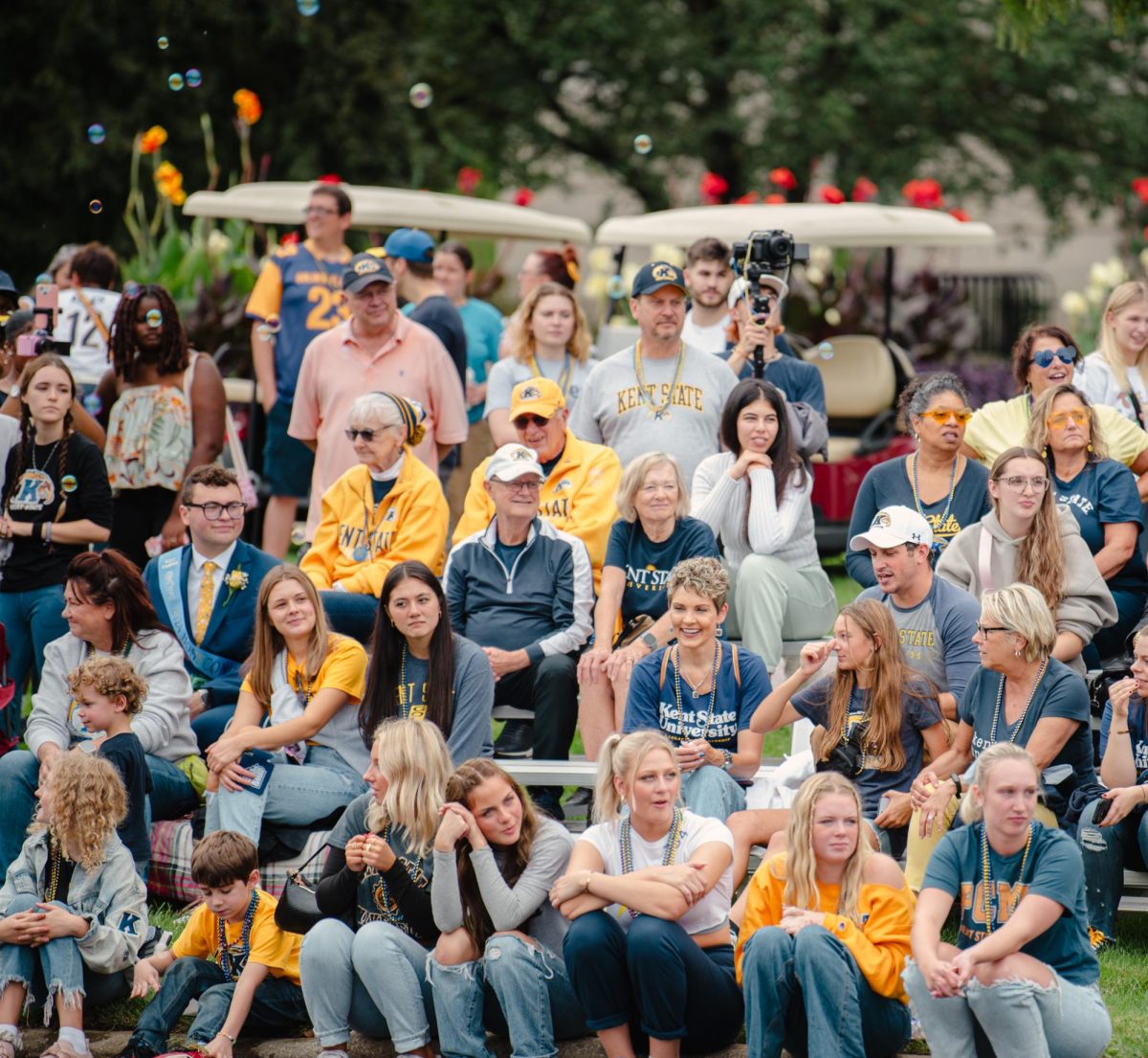 Kent State students and fans watch the Homecoming parade, Sept. 28, 2024.