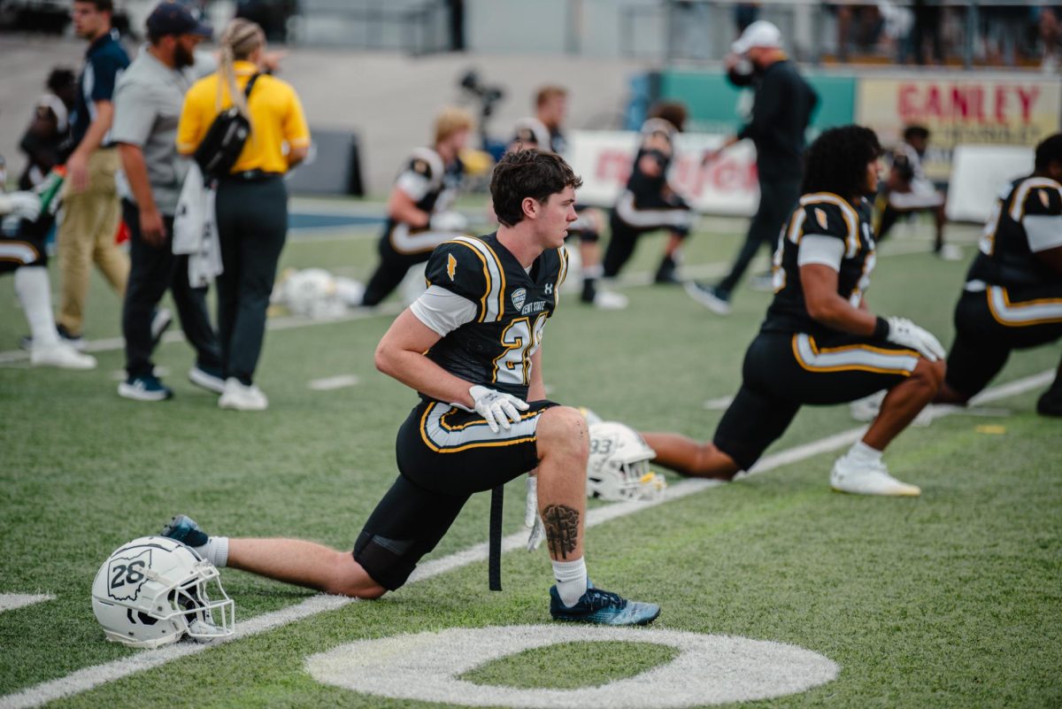 Kent State Freshman and Safety, Brodyn Bishop, warms up with his team before they play Eastern Michigan. Sept. 28, 2024