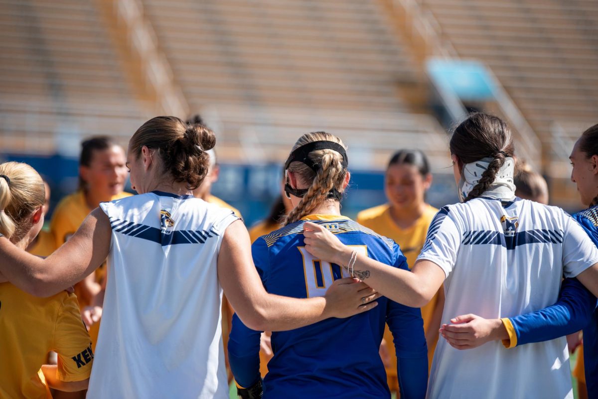 The Kent State soccer team huddle before the game against Ball State, Sept. 22, 2024.