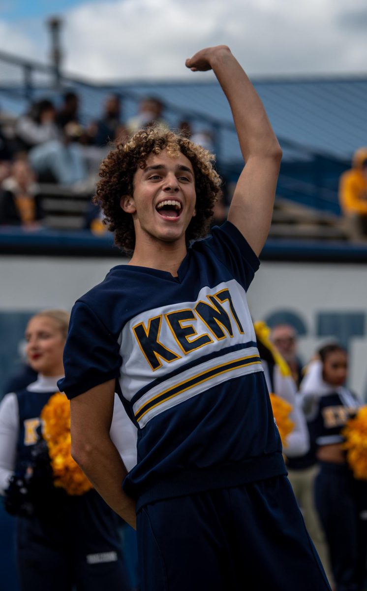 Kent State Freshman Jaden Millin cheers on Kent State's Football team during the game against St. Frances Sept. 7, 2024.