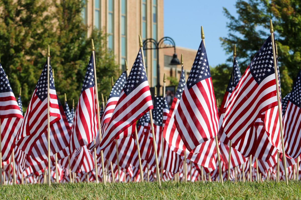 Students from the Young America's Foundation remember the Sept. 11 attacks Wednesday with a flag covered student green. The date marked 23 years since the terrorist attacks.