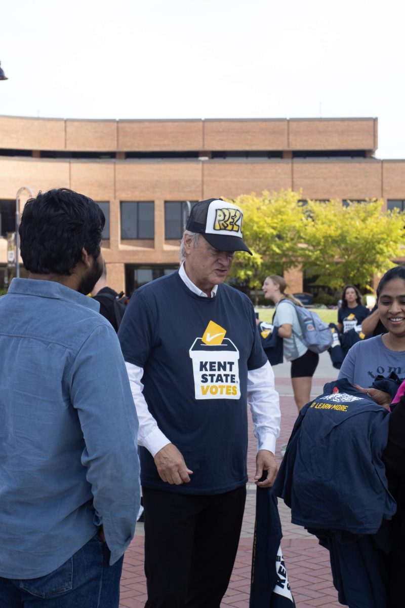 Kent State University President Todd Diacon talks with students at Kent State USG Flashes Vote Festival on Sept.17, 2024.