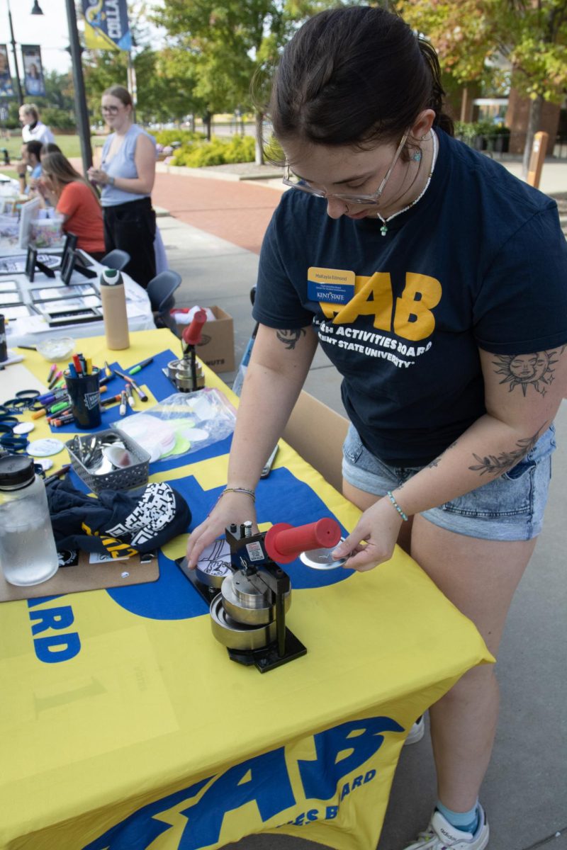 Kent State University FAB booth run by Makayla Edmond allows student visiting The K to make buttons on Sept. 17, 2024.