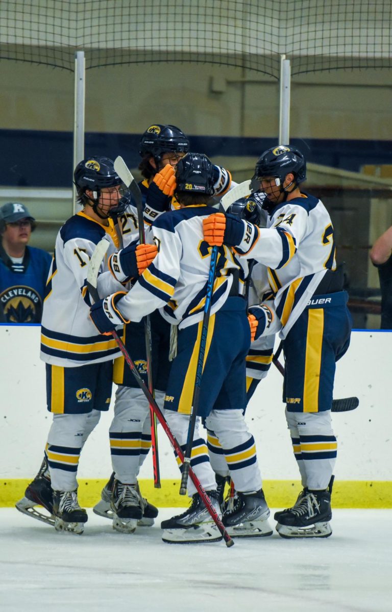 The Ice Hockey team celebrates goal made by Senior and Forward Johnny Gabriel in the third period against Northern Illinois. Sept. 14th, 2024.