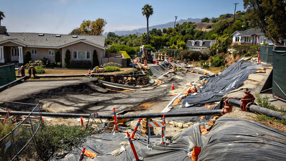 Damage from land movement is seen near the Portuguese Bend community in Rancho Palos Verdes, California, where an evacuation warning was issued and electricity was cut on Sunday.