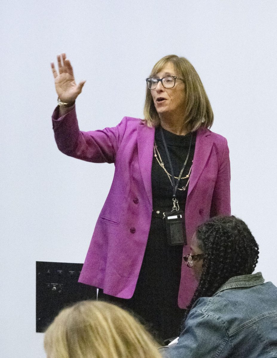 PRSSA Kent faculty advisor Michele Ewing addresses the audience at the PRSSA Kent and Kent AAF Icons and Influencers event, Sept. 18, 2024.