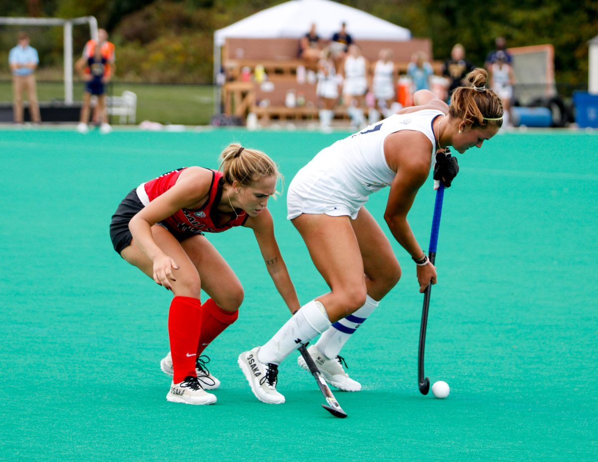 Kent State University, Junior, Emma Rolston gets the ball away from the opponent, Ball State University in their match on September 20, 2024.