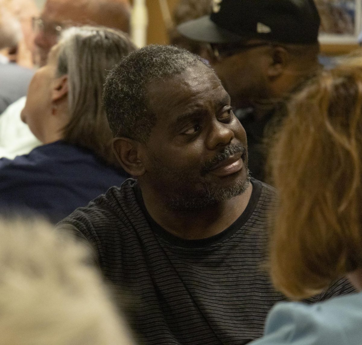 A citizen of Portage County listens to his table at the emergency NAACP meeting, Sept. 19, 2024.