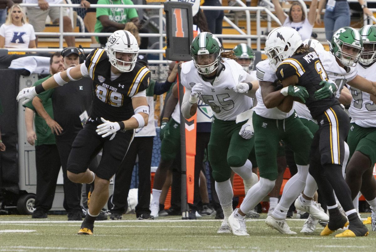 Graduate tight end Conner Muldowney (89) runs around the action at the Homecoming football game against Eastern Michigan, Sept. 28, 2024.