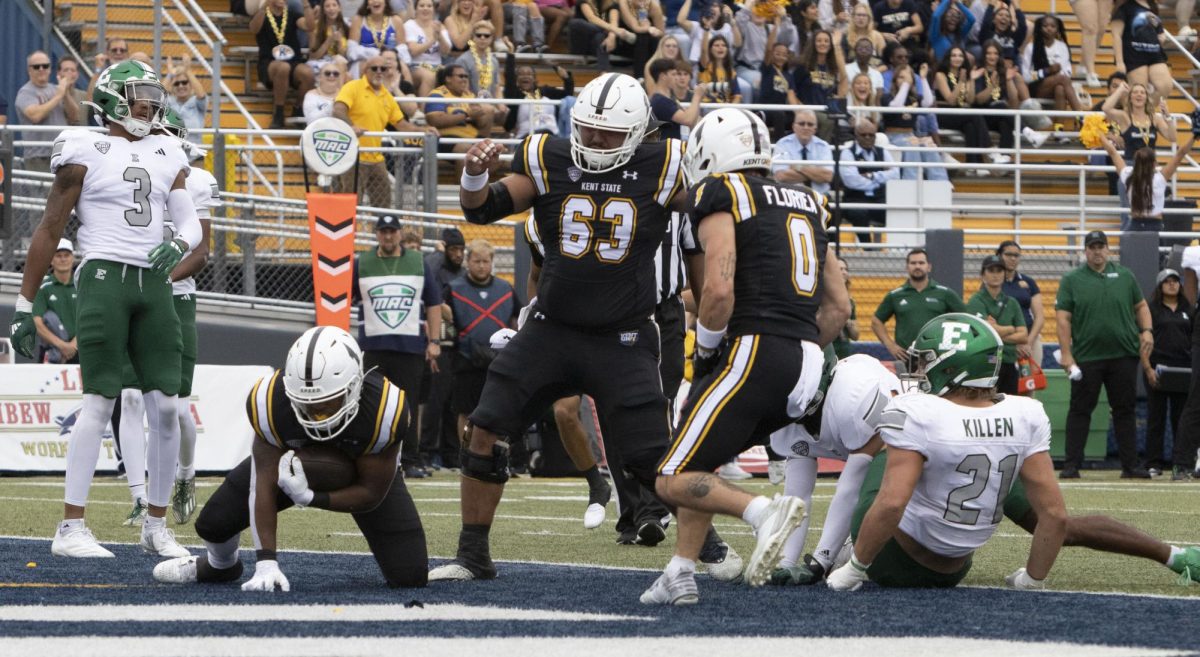 Freshman running back Ayden Harris (33) lands in the endzone at the Sept. 28, 2024 Homecoming football game against Eastern Michigan.