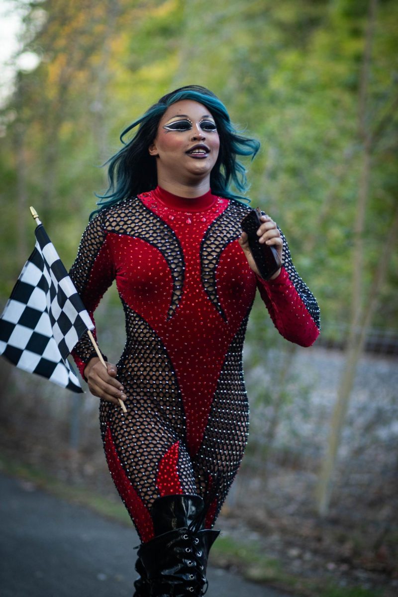 Lady Inferno runs the Drag Race 5k on Oct. 11, 2024.