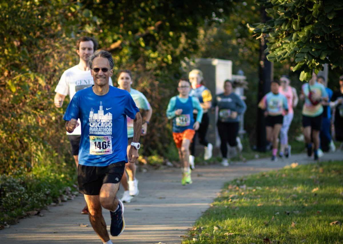 Drag Race runners run at the start of the Drag Race 5k on Oct. 11. 2024.