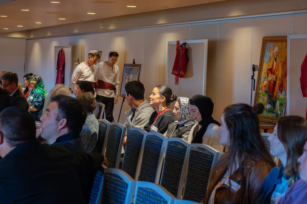 Audience Members wait for  the Poetry Tribute in honor of Magtymguly Fragi: Celebrating 300 years of His enduring Legacy to begin. 