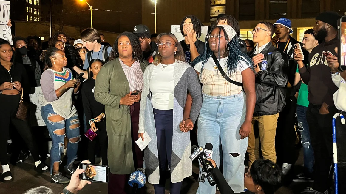 Kylah Spring, center, is seen speaking at a march against racism on University of Kentucky's campus on Monday, Nov. 7, 2022 in Lexington, Ky. She was working at a dorm when she was verbally attacked by a White student who was intoxicated.