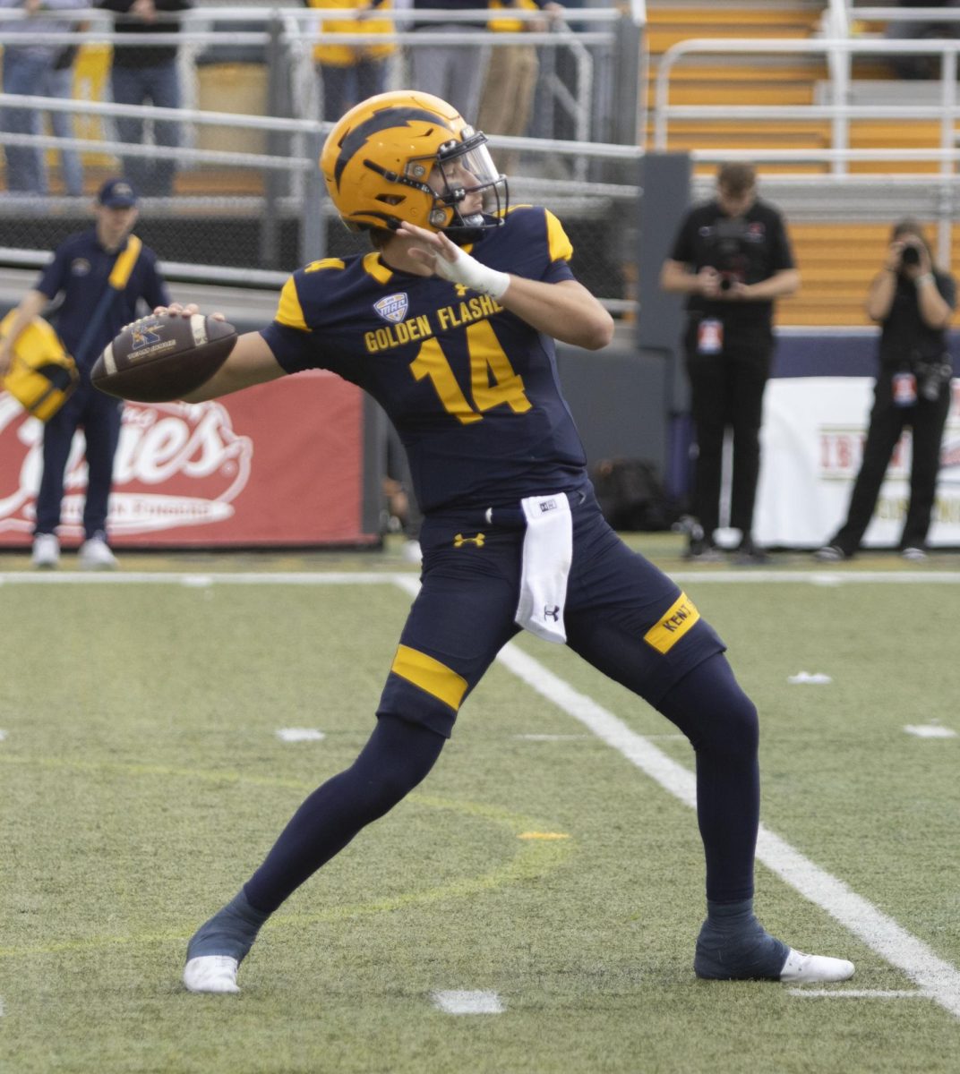 Tommy Ulatowski (14) aims his throw at the football game against Ball State Oct. 12, 2024.