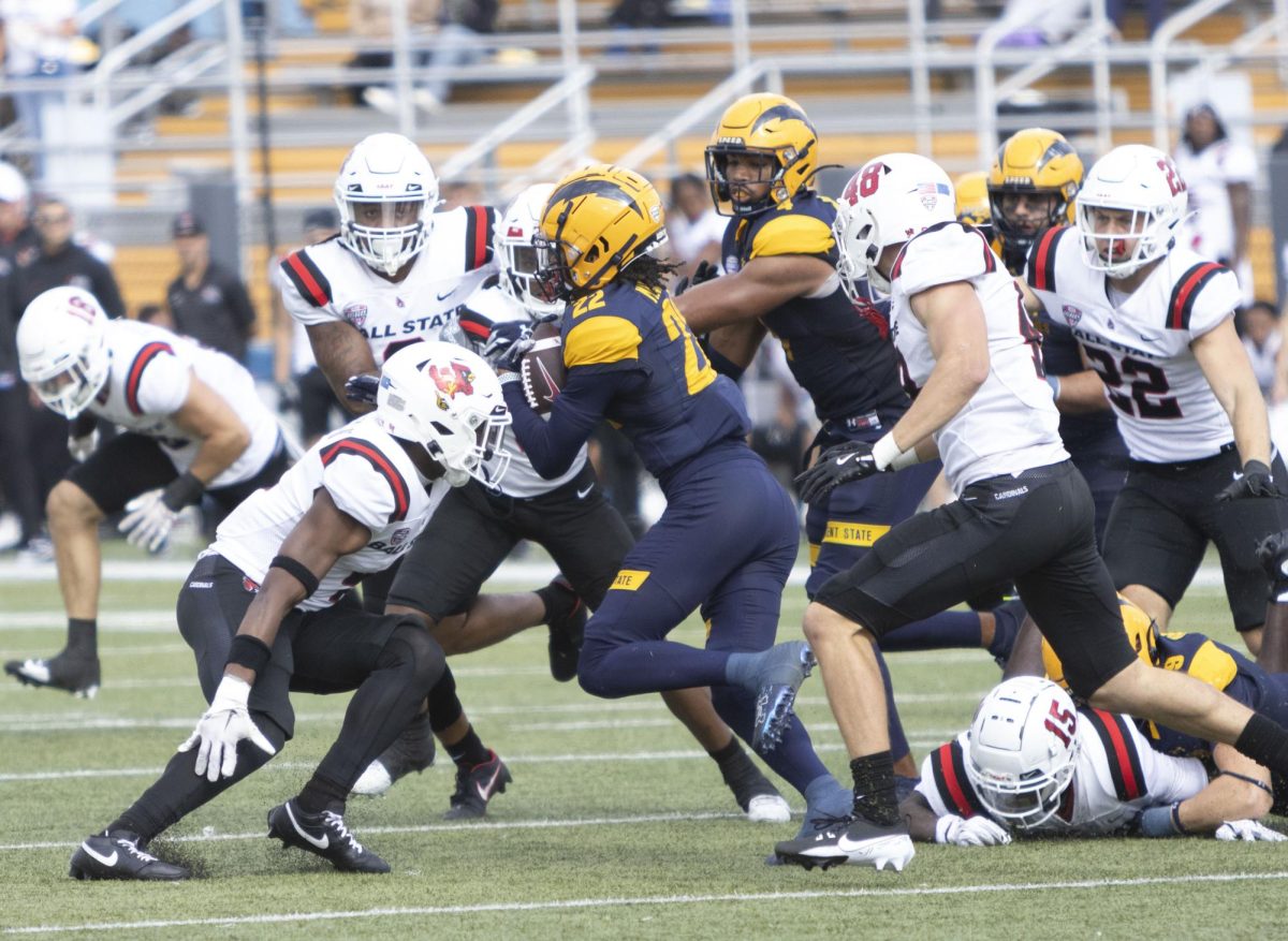 Wide receiver Chrishon McCray (2) tries to avoid getting tackled by Ball State players at the football game Oct. 12, 2024.