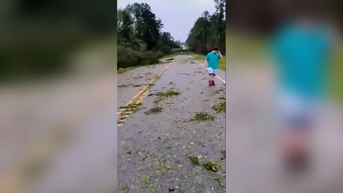 A photo taken in Hazlehurst, Georgia, on Monday, October 14 shows a roadway still cluttered with storm debris.