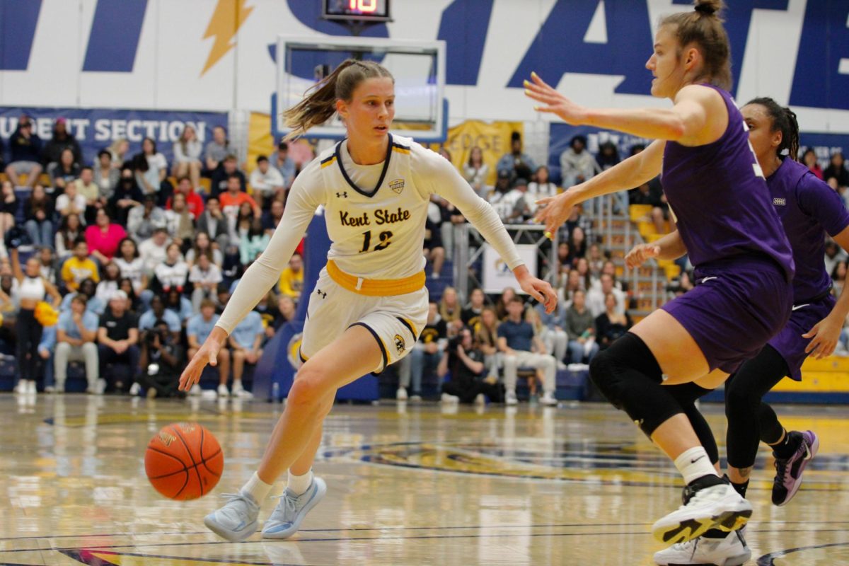 Kent State senior guard Jenna Batsch dribbles the ball down the court against opponent James Madison Nov. 4, 2024 in the M.A.C.C. 