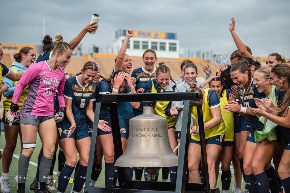 Members of the Kent State soccer team celebrates their win against Bowling Green Oct. 31, 2024.