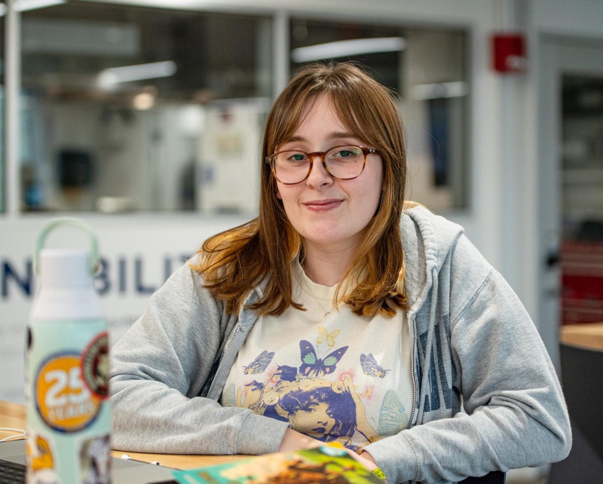 Grace Dugan sits for a portrait at the DI Hub, Nov. 6, 2024.