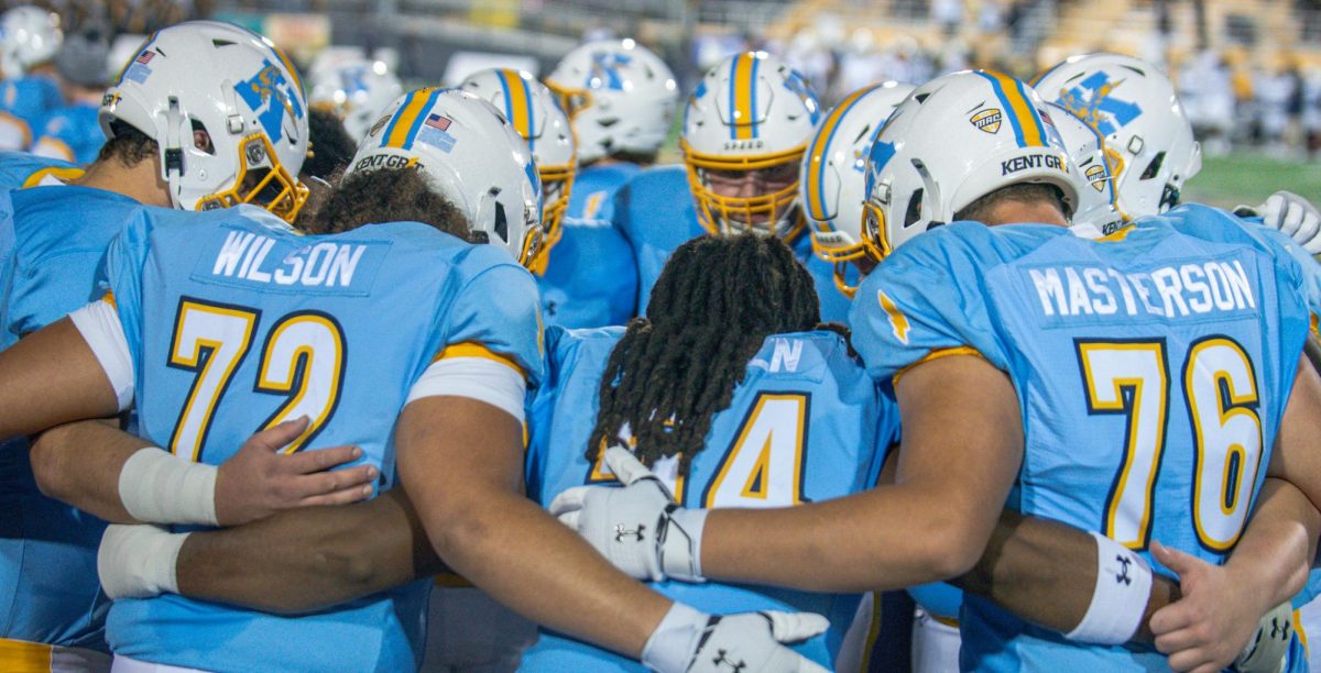 Kent State Seniors huddled up before they play against their rivals Akron. Nov 19, 2024.