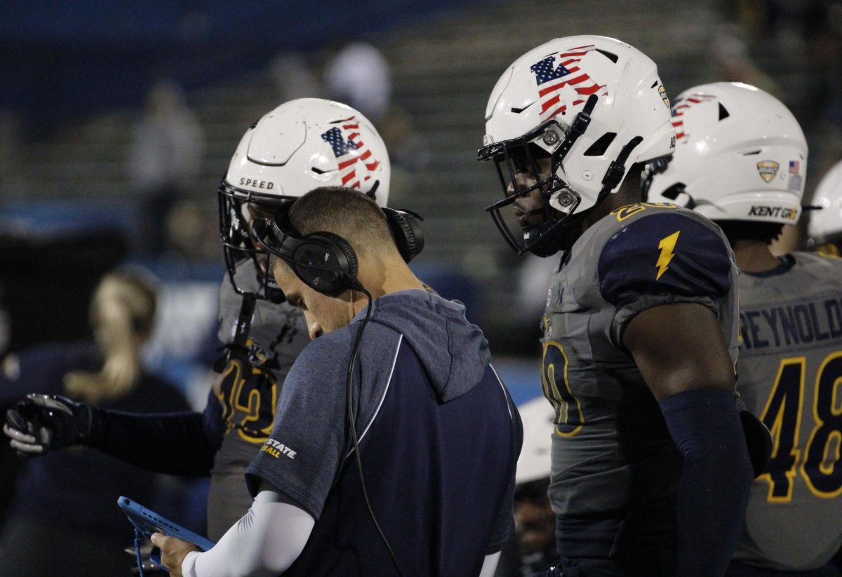 Kent State University football team prepared for the next play against Ohio University on November 6, 2024. 