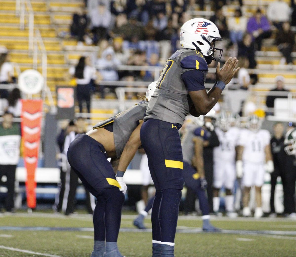 Freshman quarterback Ruel Tomlinson gets ready to give the call to the receive the ball during their game against Ohio University on November 6, 2024. 