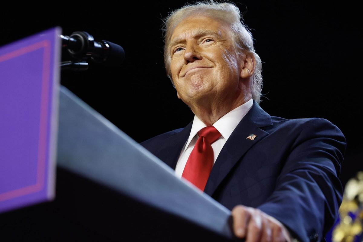 Republican presidential nominee, former President Donald Trump arrives to speak during an election night event at the Palm Beach Convention Center on Wednesday, November 6.