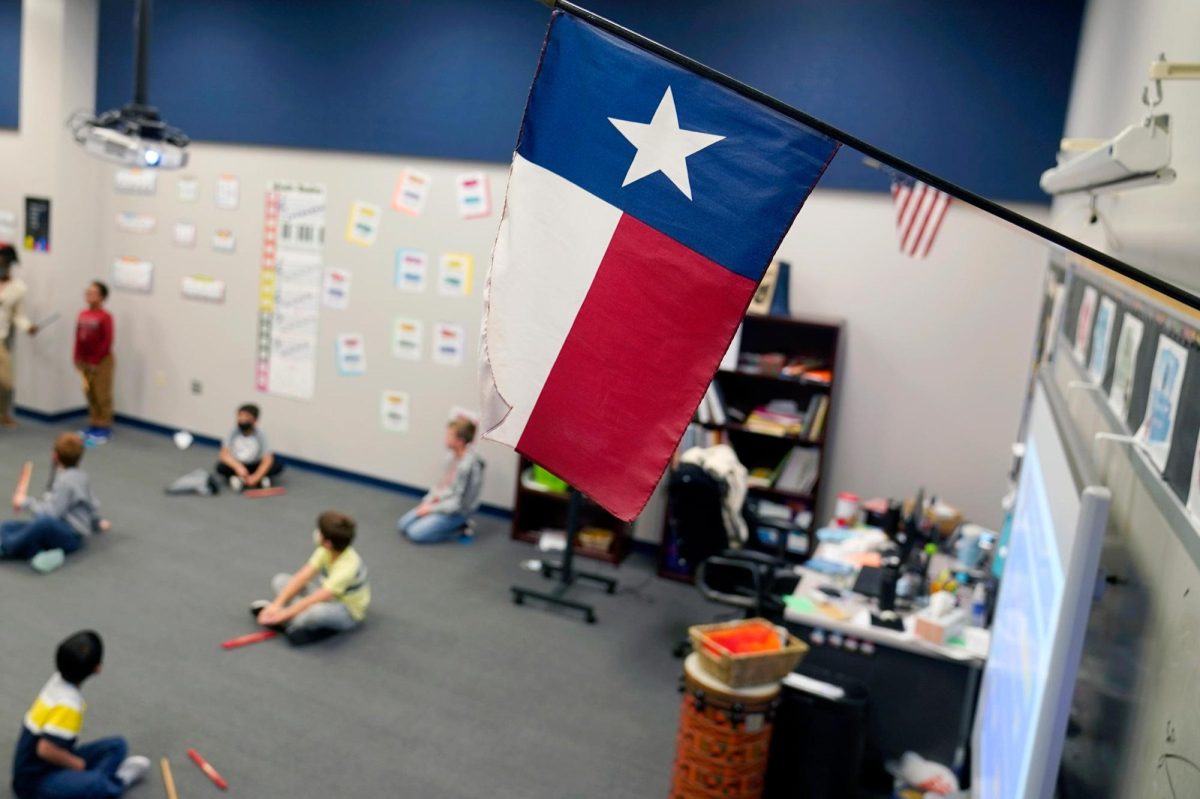 A Texas flag is displayed in an elementary school in Murphy, Texas, in December 2020.