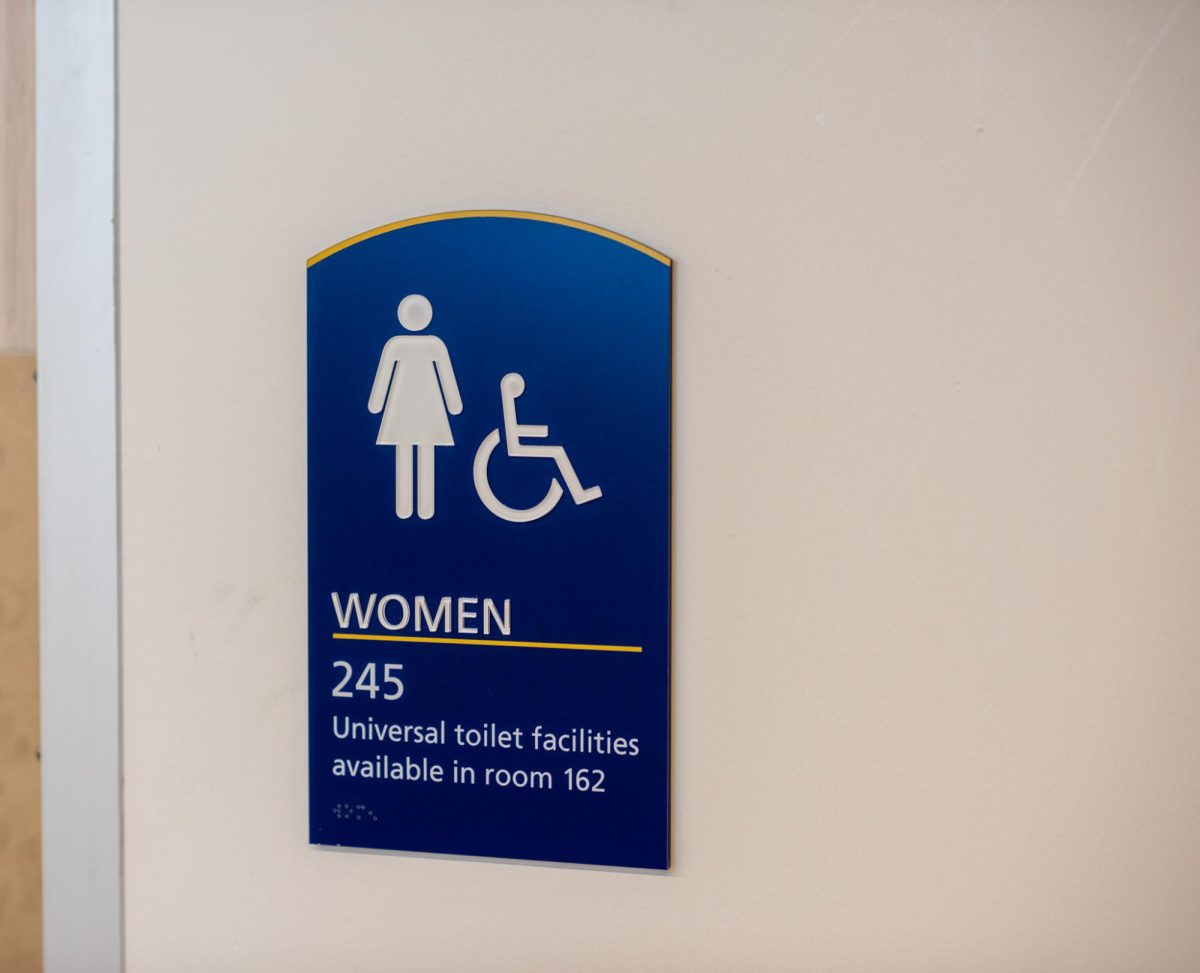 A women's bathroom located in the Center for the Visual Arts with directions to universal facilities Jan. 17, 2025.