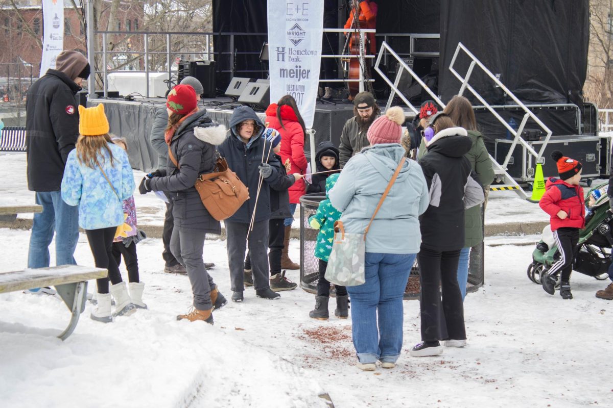 The Kent community enjoying free s'mores ACME fresh market on Jan. 25,2025.  