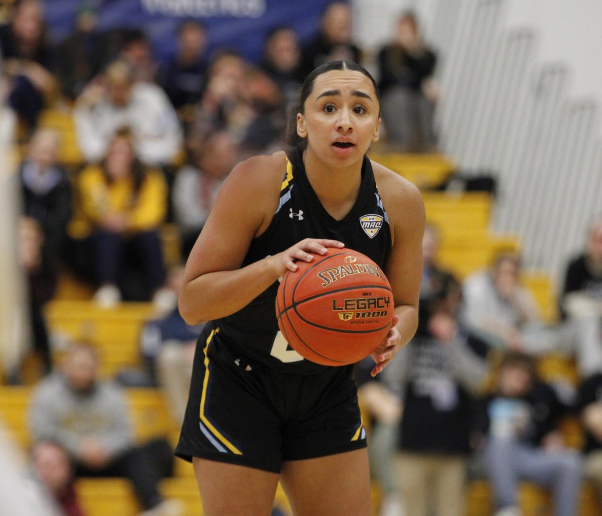 Kent State University junior guard Dionna Gray dribbling the ball in their game against Ball State University on Jan. 15, 2025. 