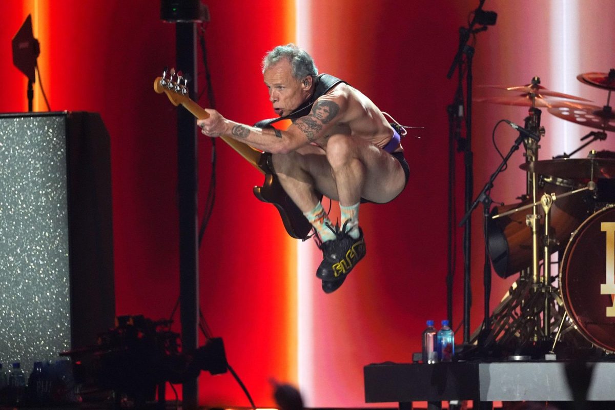 Flea of Red Hot Chili Peppers performs during the FireAid benefit concert at The Forum in Inglewood, California, on Thursday.