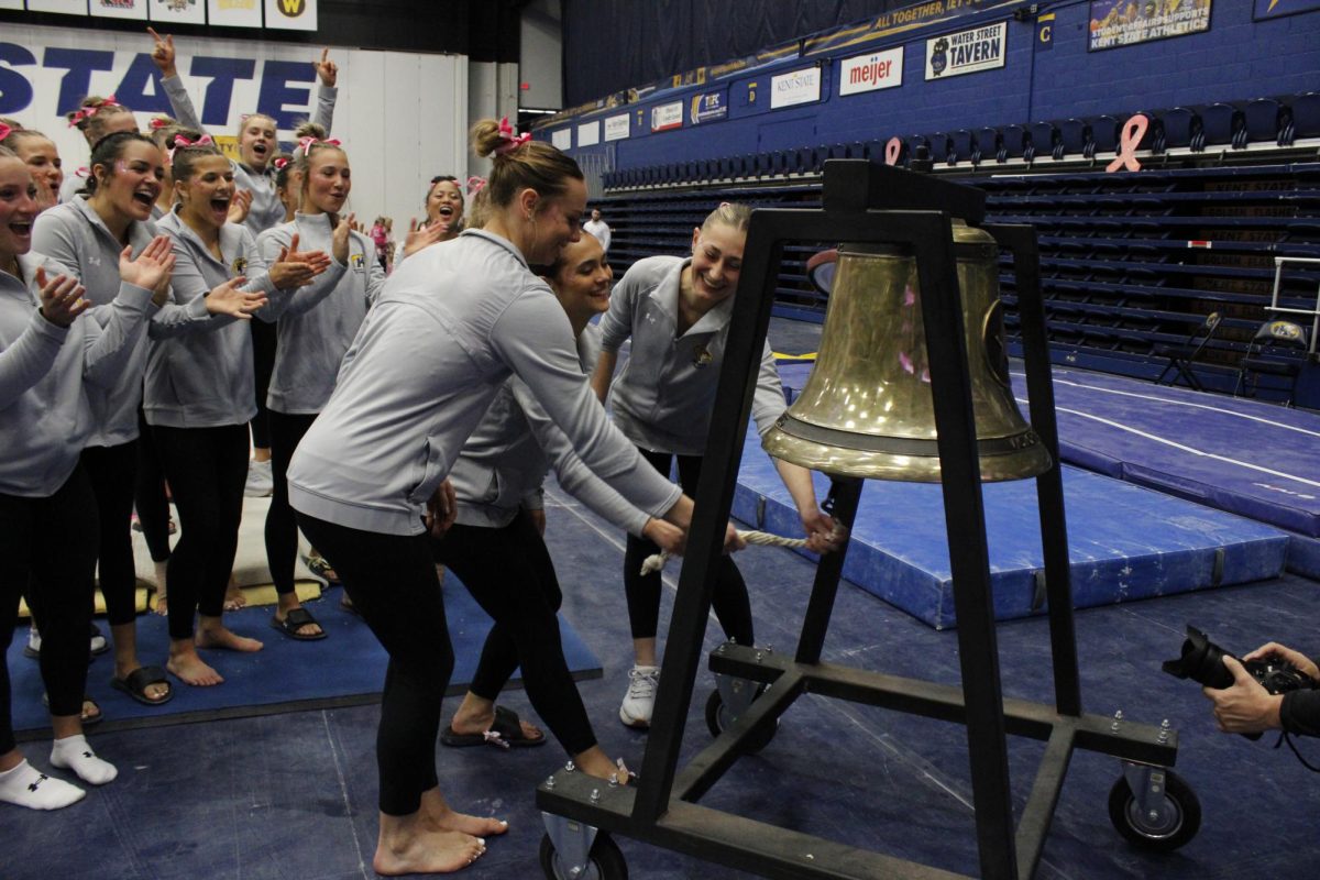 Kent State University Gymnastics team rings the victory bell after winning their match against Western Michigan University on Feb. 2, 2025.