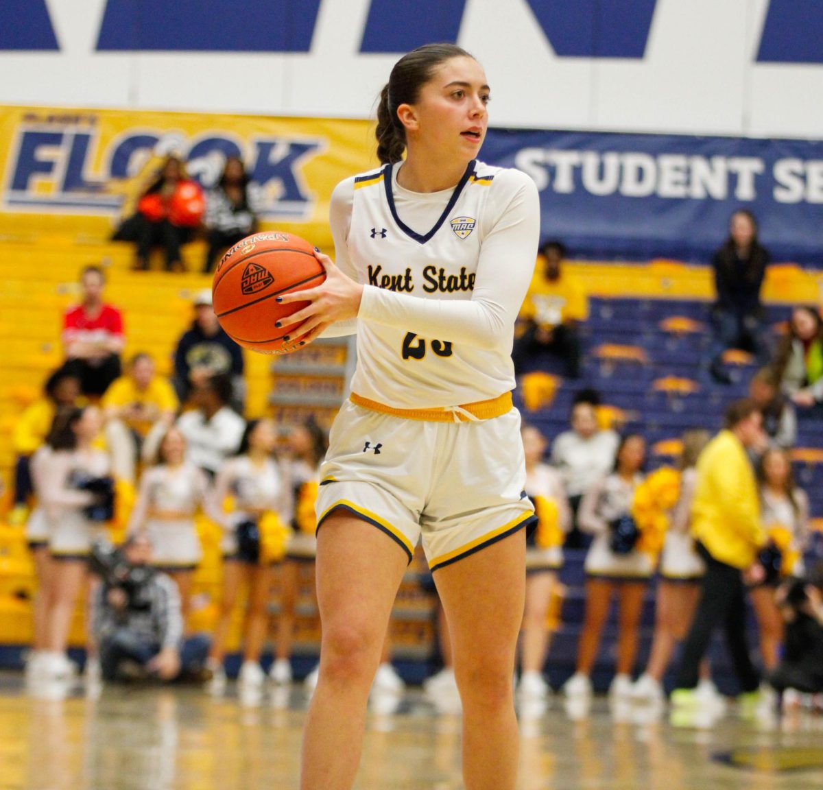 Kent State University sophomore guard Mya Babbitt holding the ball as she tries to figure out which teammate to pass it to during their game against the University of Akron on Feb. 1, 2025. 