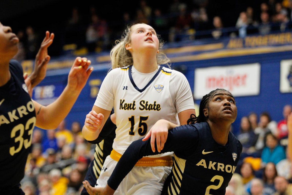 Kent State University senior forward Bridget Dunn, 15, gets guarded by University of Akron senior guard Alexus Mobley, 2, during their game on Feb. 1, 2025. 