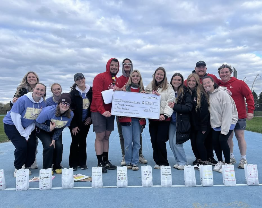 Max Moriarty, a junior recreation and park management major, poses with other Relay for Life participants after the marathon concluded last year.