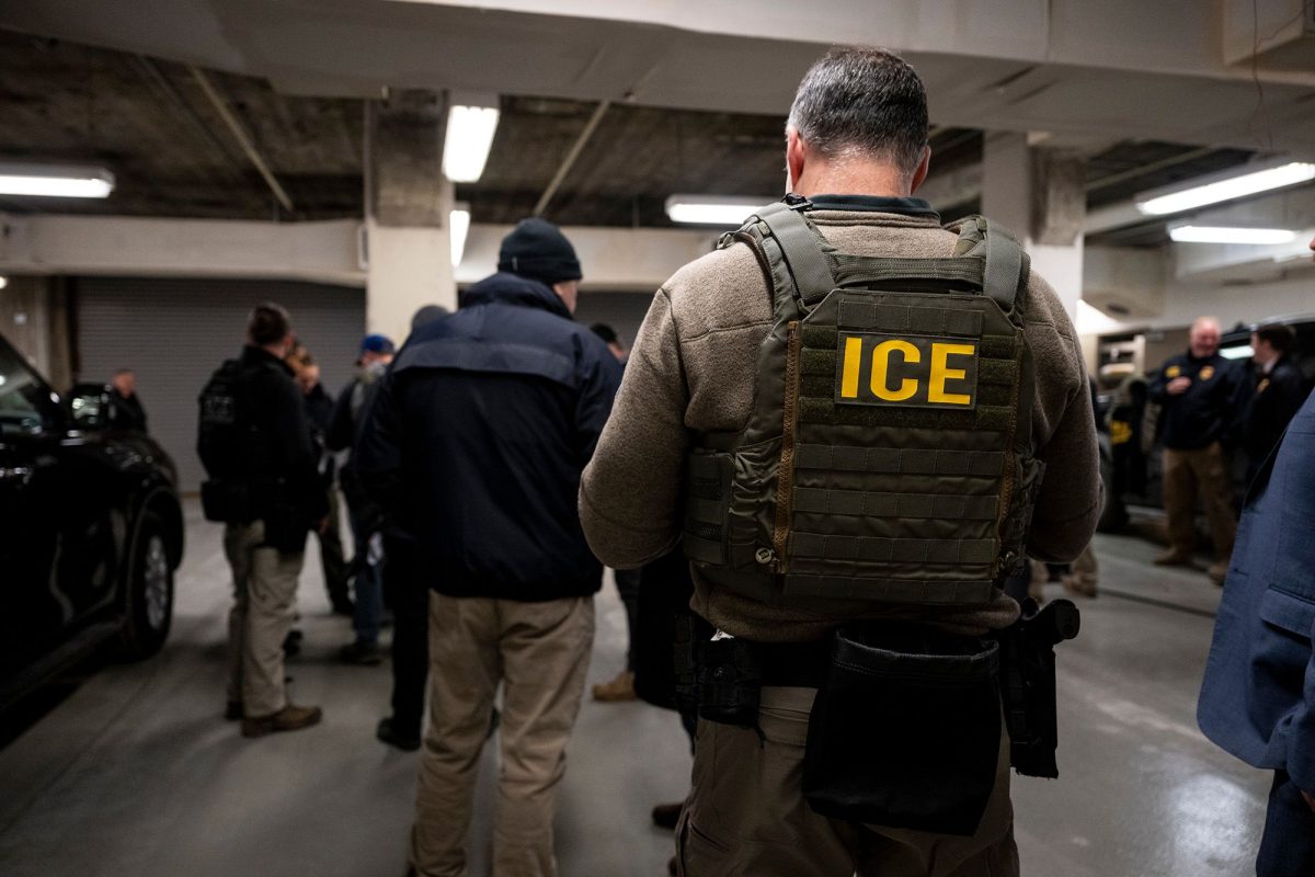 US Immigration and Customs Enforcement agents, along with other federal law enforcement agencies, attend a pre-enforcement meeting in Chicago on January 26.