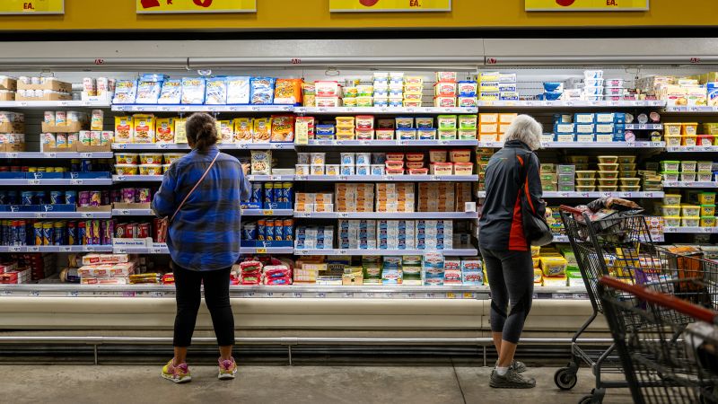 Customers shop for produce at an H-E-B grocery store on February 12 in Austin, Texas.