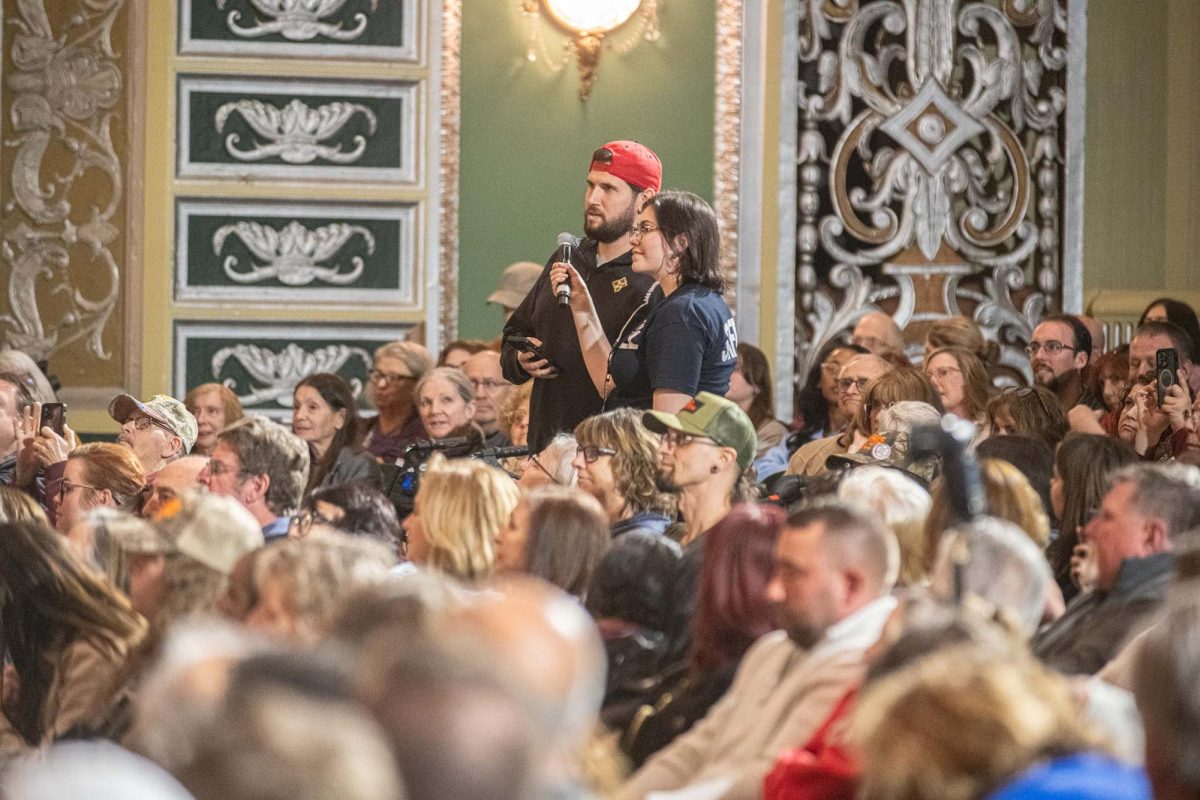 A Veteran asks Tim Walz about how to talk to peers whose views differs during the People's Town Hall on Monday, April 7, 2025.