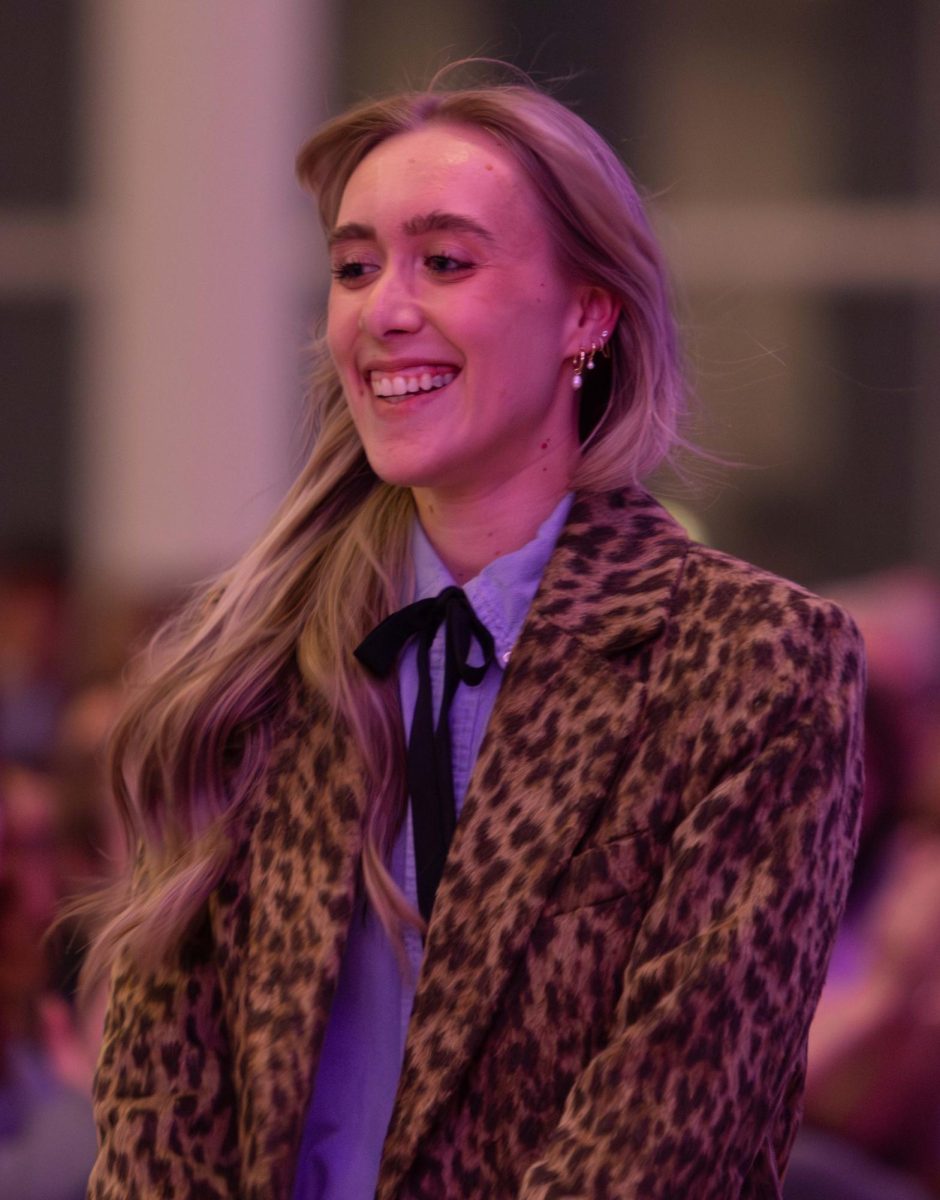 Senior fashion design major Caroline Hill goes to receive the Best of Show award at the annual fashion show on April 25, 2025.